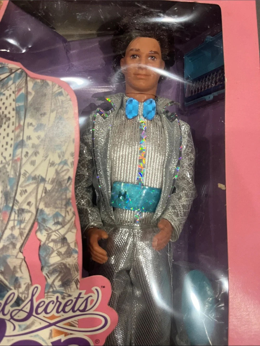 Mattel Ken in Metallic Silver Outfit with Aqua Accents